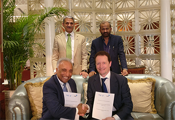 Photo of Luis Jorge Romero and Rajan S Mathews showing the signed MoU