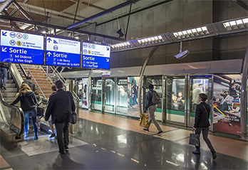 Image of RATP in Paris with train and people