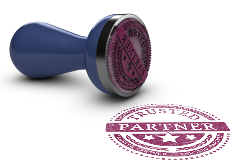 Stamp and stamped text "Trusted Partner"