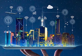Smart cities image with buildings and IoT icons