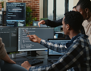 People looking at a computer screen