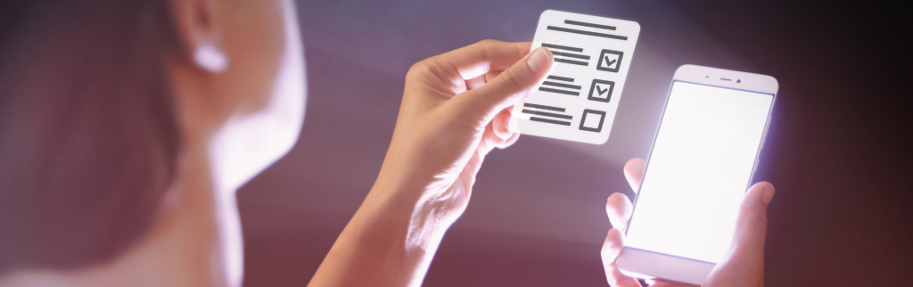Woman with a smartphone in her hand holding a questionnaire