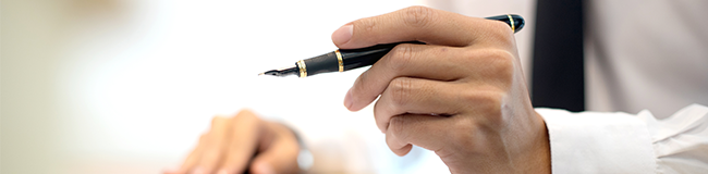 Man holding a pen