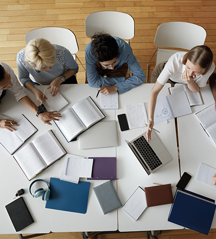 Group of people working together on a table